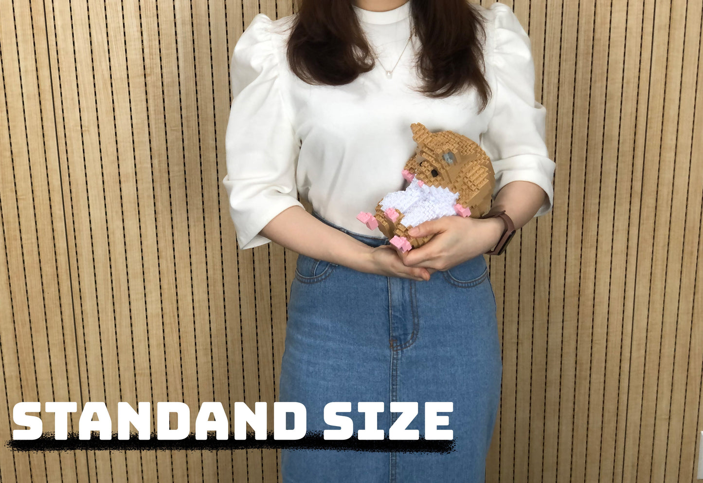 Hamster beige sur le dos