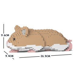 Hamster beige couché