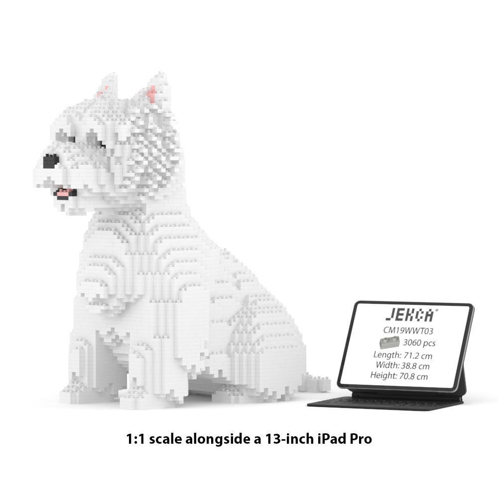 Chien West Highland White assis