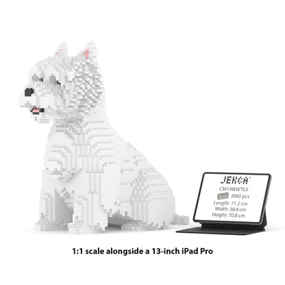 Chien West Highland White assis