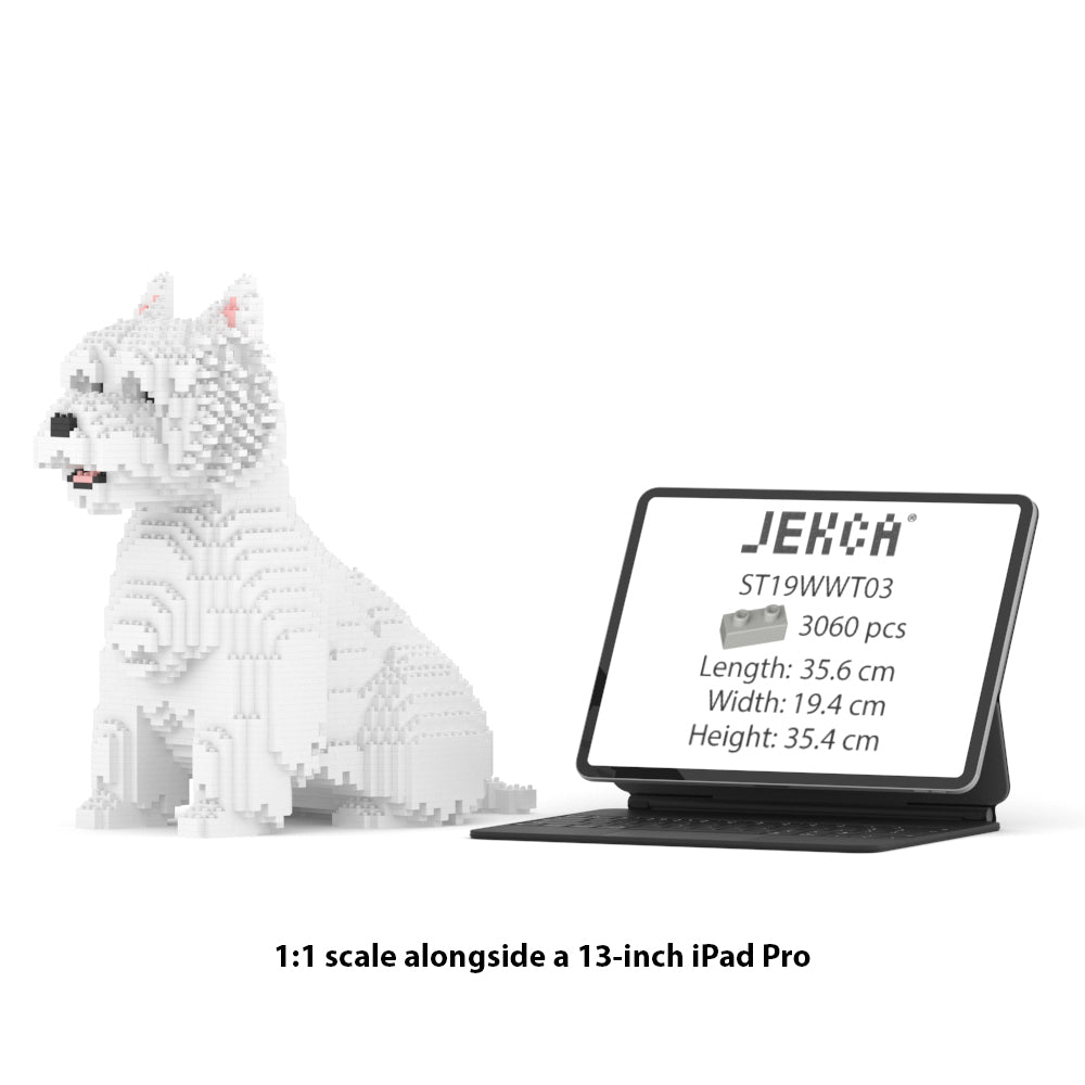 Chien West Highland White assis